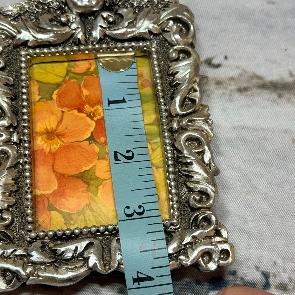 Ornate Silver Picture Frame with scrolling Art cherub detail 3x5”‎